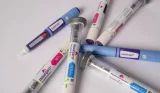 A close up of weight loss injection pens