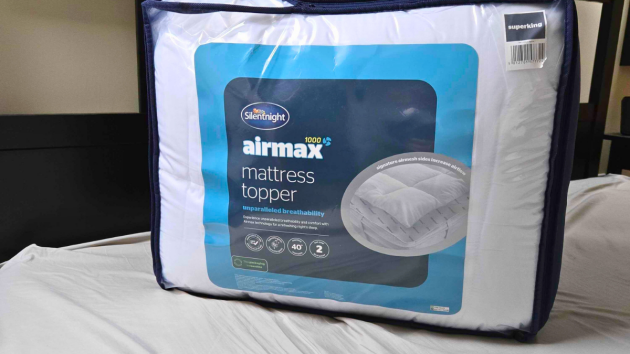A close up view of the Silentnight Airmax 1000 mattress topper in its packaging