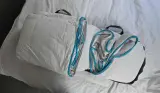 The Simba Hybrid 3-in-1 Duvet still in its carry bag open on a bed