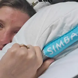 Editor Rebecca lays her head on the Simba Hybrid Pillow