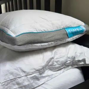 A side view of the Simba Hybrid Pillow atop a Loaf pillow