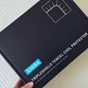 The box of the Simba TripleShield Tencel Cool Mattress Protector