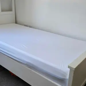 Simba TripleShield Tencel Cool Mattress Protector on the bed