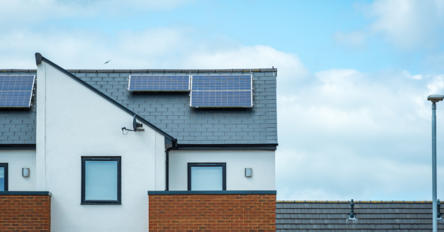 a modern house with solar panels