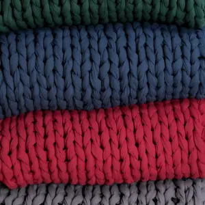 A close up of the different colours of the Sommio Knitted Weighted Blanket
