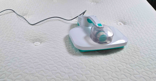 A shot of the Spring & Spruce Mattress Maid atop a clean mattress