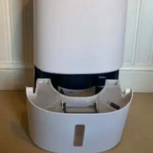 Mumsnet editor Poppy O'Neill hand testing the MeacoDry Arete® One 12L Dual Dehumidifier & HEPA Air Purifier