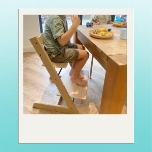 Stokke Tripp trapp highchair in testing with a child using it on the oldest setting