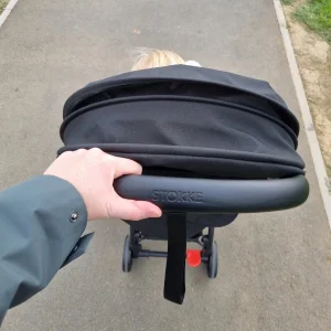 Woman pushing Stokke Yoyo 5