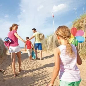 Talacre Beach Resort family walking to the beach
