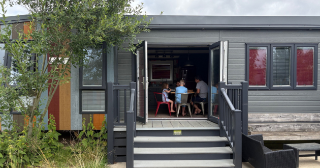 The stripey exterior of the TriBeCa caravan at Tattershall Lakes Country Park