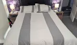 The TEMPUR Pro Air SmartCool Plus mattress with bedding on