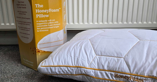 Side by side The HoneyFoam Pillow by The Fine Bedding Company packaging and pillow