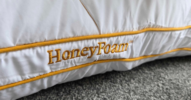 A close up of the HoneyFoam pillow branding