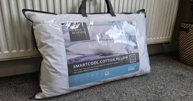 The Fine Bedding Company Cooling Smart Temperature Cotton Pillow in its bag