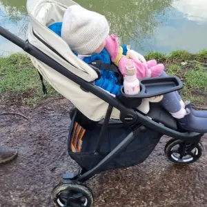 Child in Thule Spring 2 buggy
