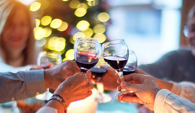 Toasting drinks at a dinner party