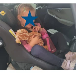 Toddler sitting in Graco DLX i-Size