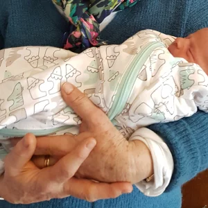 Tommee Tippee Grobag swaddle bag being used by newborn baby