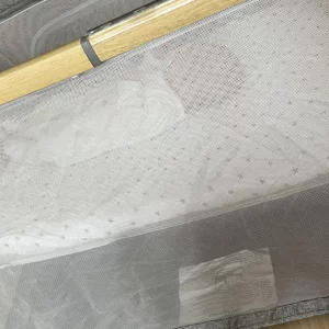 Tutti Bambini Cozee go travel cot review image of travel cot in testing with real baby