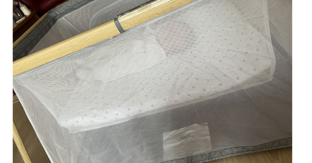 Tutti Bambini Cozee go travel cot review image of travel cot in testing with real baby