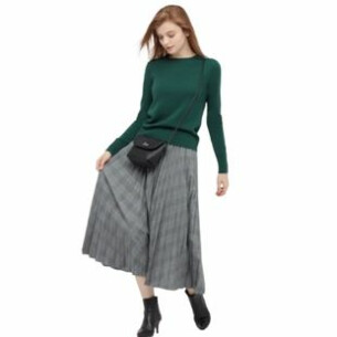 woman in green crew neck jumper