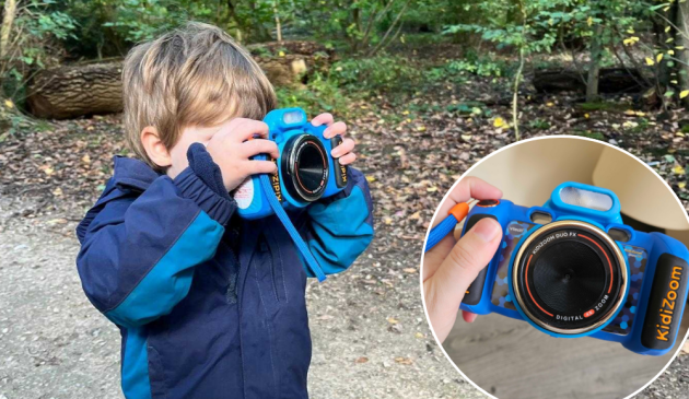 A young boy in the woods using the VTECH KidiZoom Duo FX camera. Inset is a close-up image of the camera