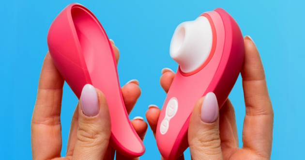 A picture of a pair of hands holding the Womanizer Liberty 2 open