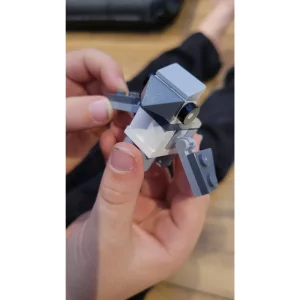 LEGO Harry Potter advent calendar in testing - close up of child's hand holding Hippogriff mini build