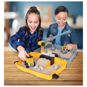Kinetic Sand Construction Site Folding Sand Box image shows children playing