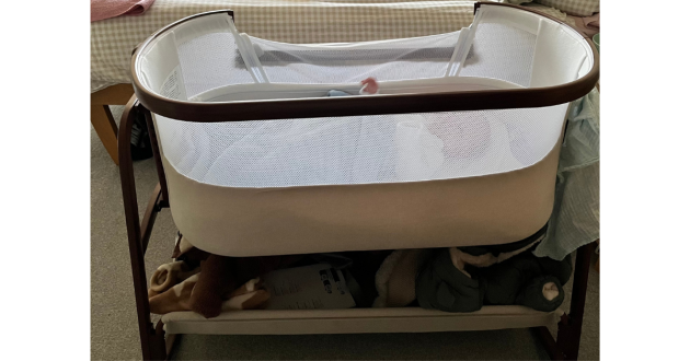 Ickle Bubba Bubba&Me Luxe crib review image 3 showing the crib in testing with a real baby
