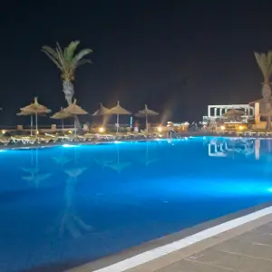 Holiday Village AQI Skanes Tunisia relax pool at night