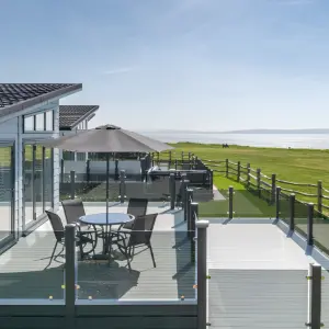 Hoburne Naish Holiday Park caravan with balcony and sea view