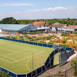 Hoburne Naish Holiday Park aerial image of sports area, adventure golf and pool