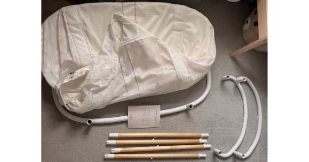 BabyBjörn Baby Crib review image showing dismantled crib
