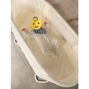 BabyBjörn Baby Crib review image of crib with baby
