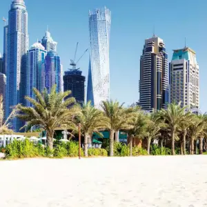 City scape off a white, sandy beach in Dubai