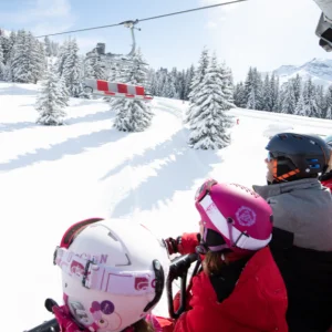 Avoriaz, France shot of family on a ski lift
