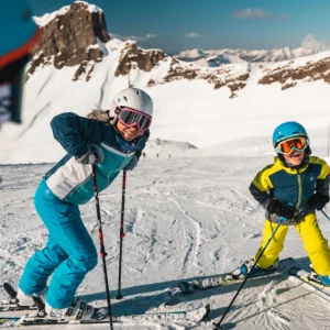 Flaine, France - shot of kids on skis in the snow, Mathis Decroux