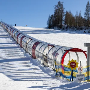 Seefeld ski resort - ski tunnel lift on nursery slope