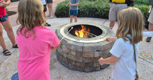 Toasting marshmallows at the Sorcerer’s Campfire