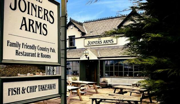 Picture of the Joiners Arms and its sign outside.