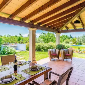Villa C'an Moscard terrace with outdoor dining table and chairs
