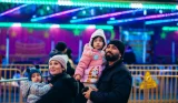 A family enjoy Winter Wonderland in London