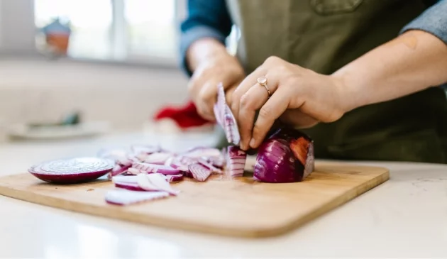 Woman chopping onions