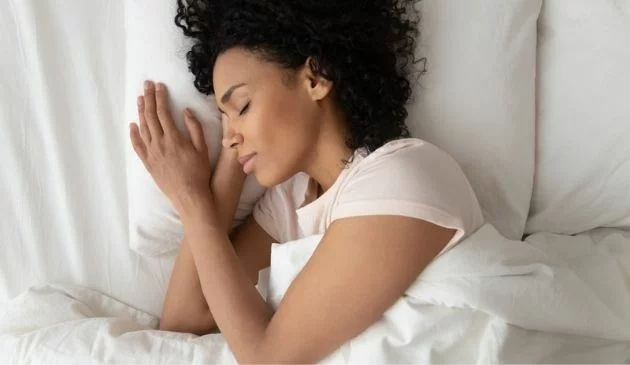 woman sleeping in bed