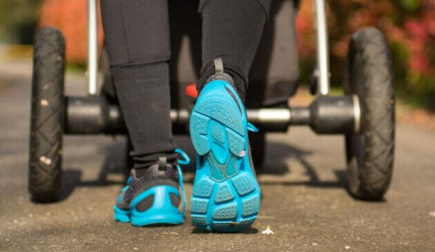 Woman pushing a buggy