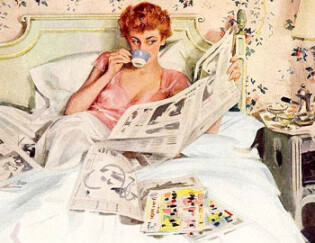 Woman in bed reading