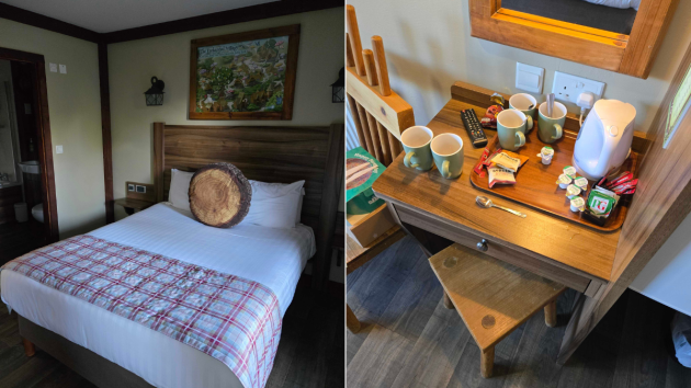 The bed and hot drink making facilities in the room at Woodland Lodges