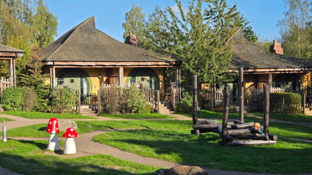 A child plays on a playing frame at Woodland Lodges in Alton Towers